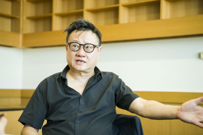 A photo of Eric Khoo during the interview