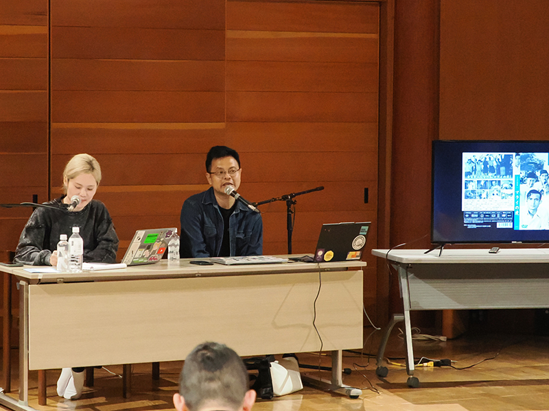 Two people are giving presentations at the workshop.